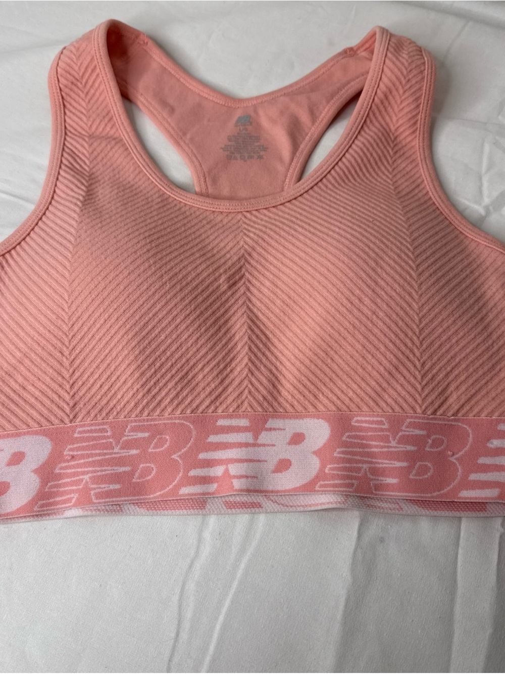 New Balance Pink Seamless Racerback Sports Bra with Logo Band